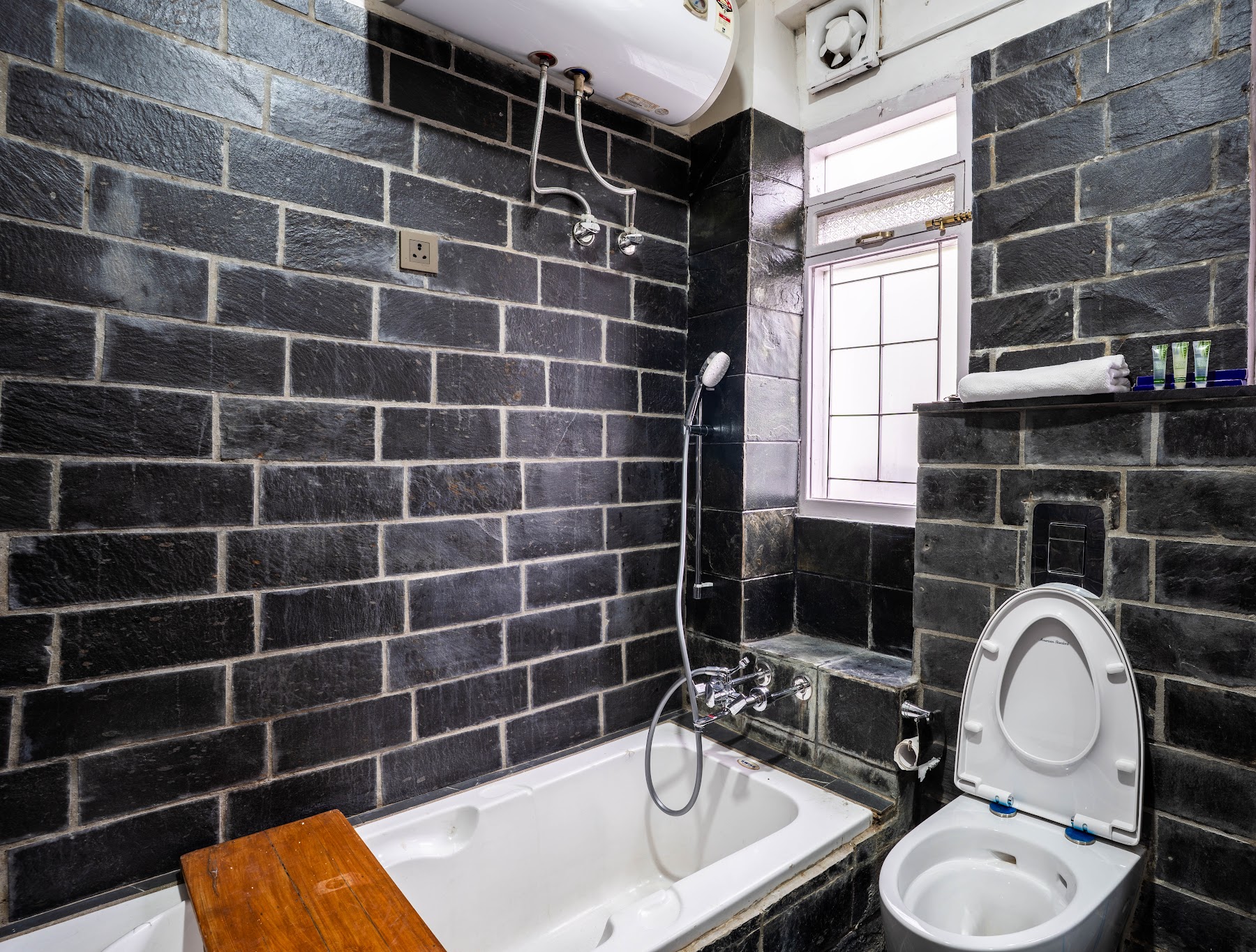 Bathtub and shower in the first-floor bathroom