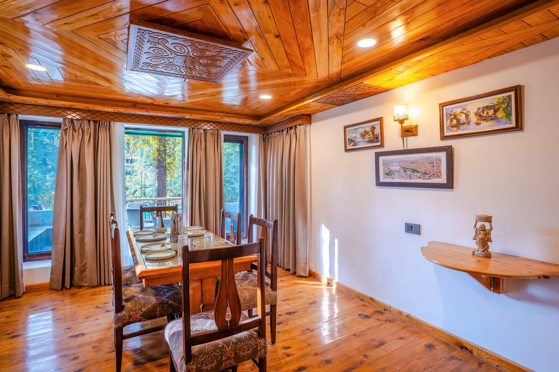 Wooden dining chairs and table in the first-floor suite