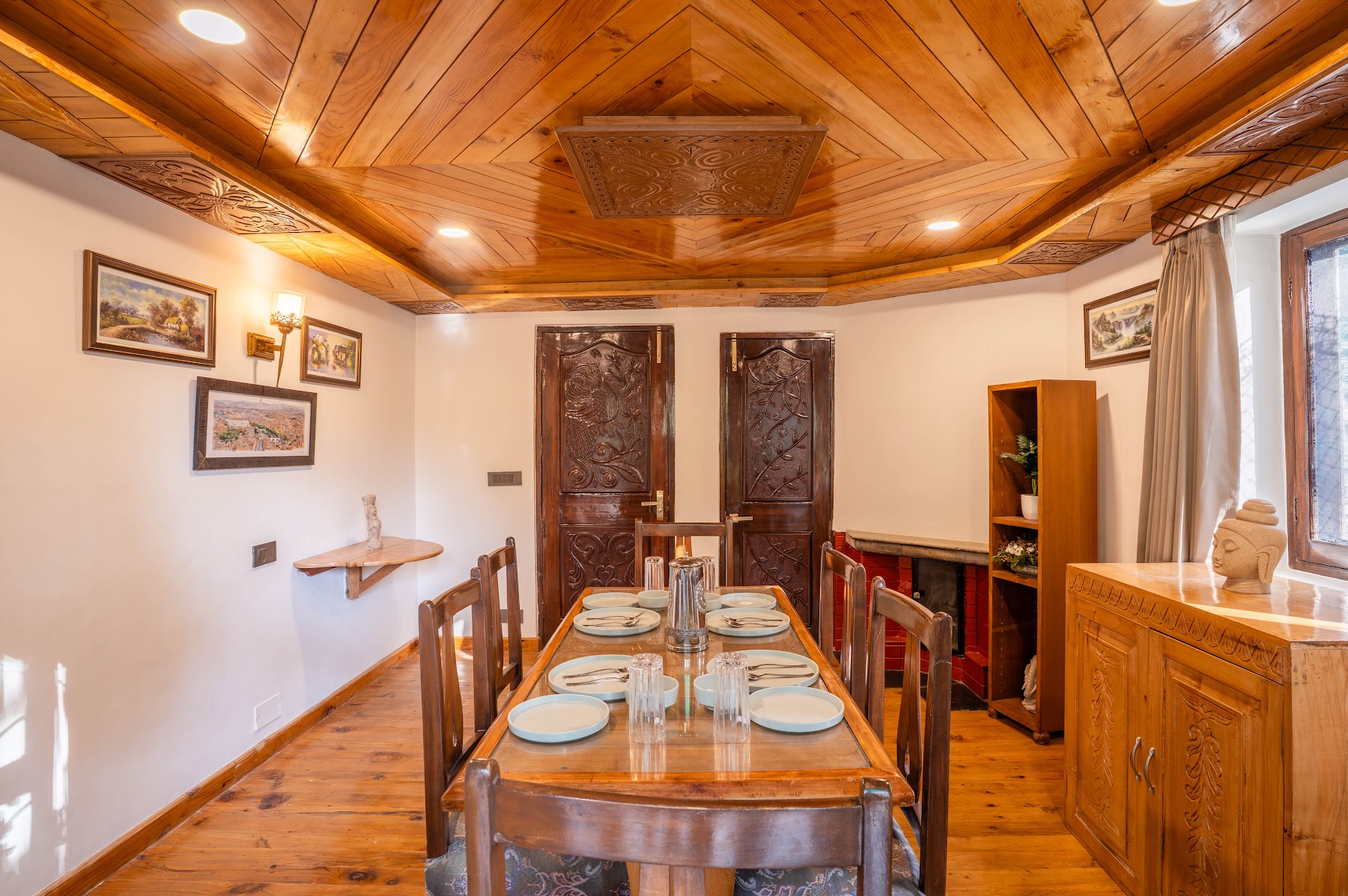 Dining area of the first-floor suite with wooden ceiling