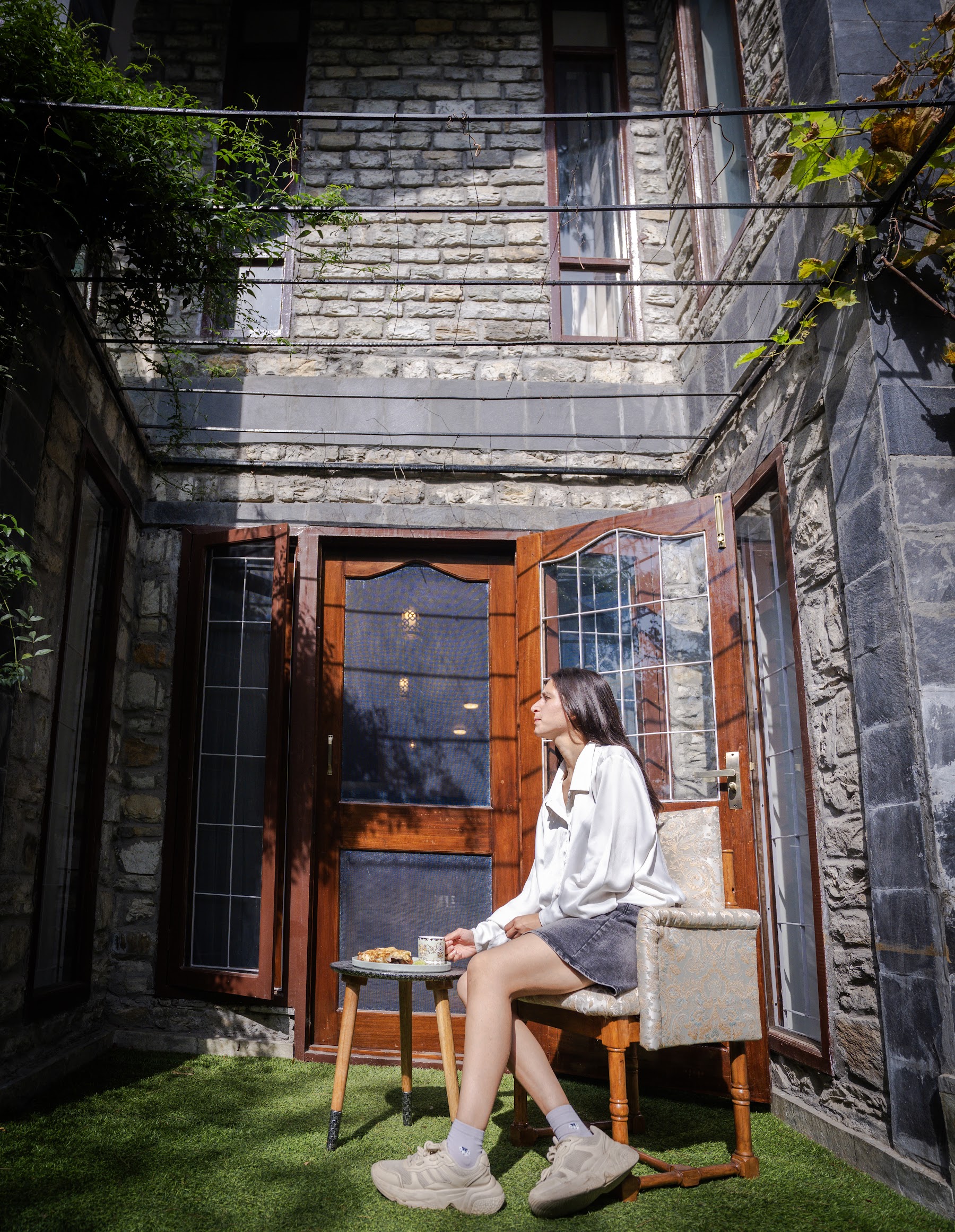 Stone walls and wooden windows of the private courtyard