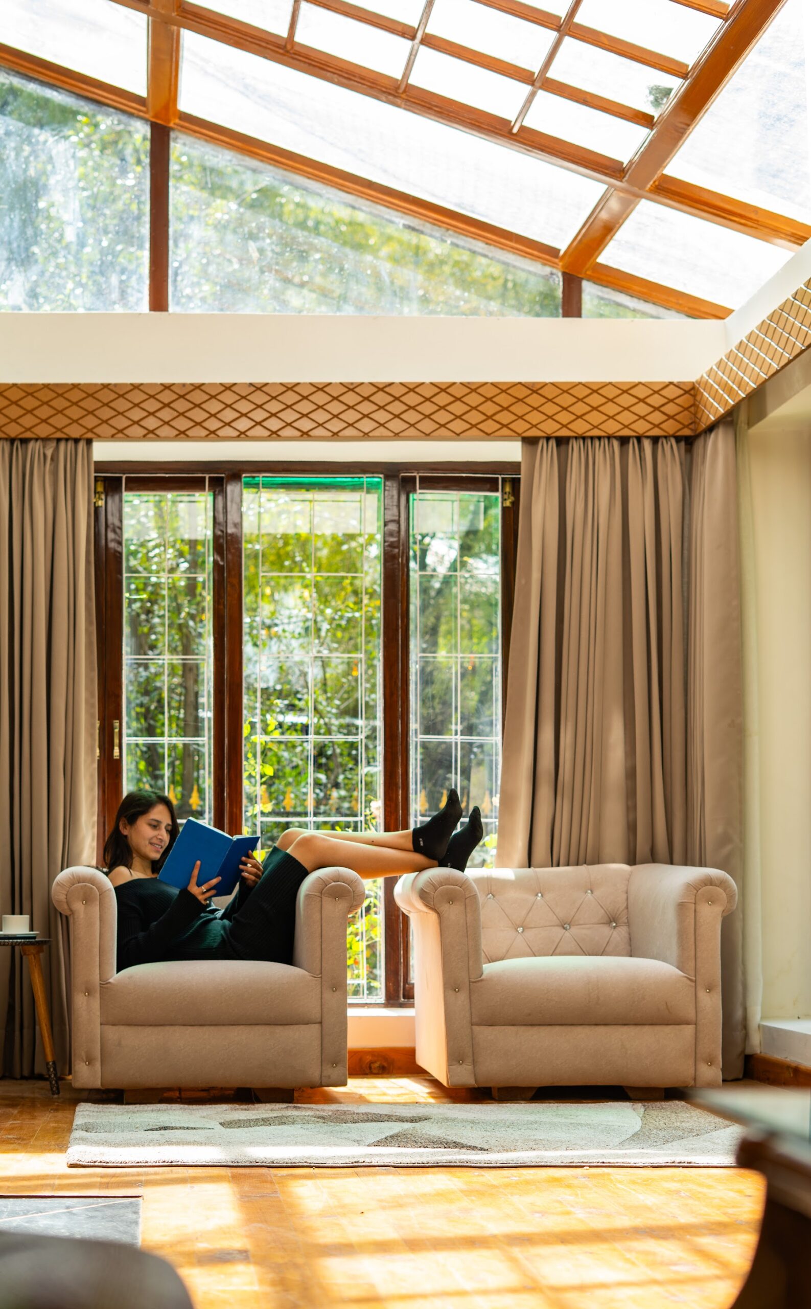 Sunlit living area under the glass roof